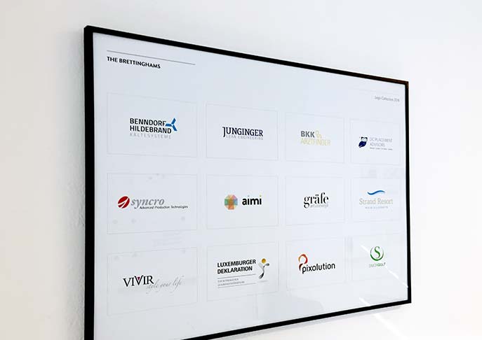 Abgebildet sind verschiedenen Logo-Designs.
